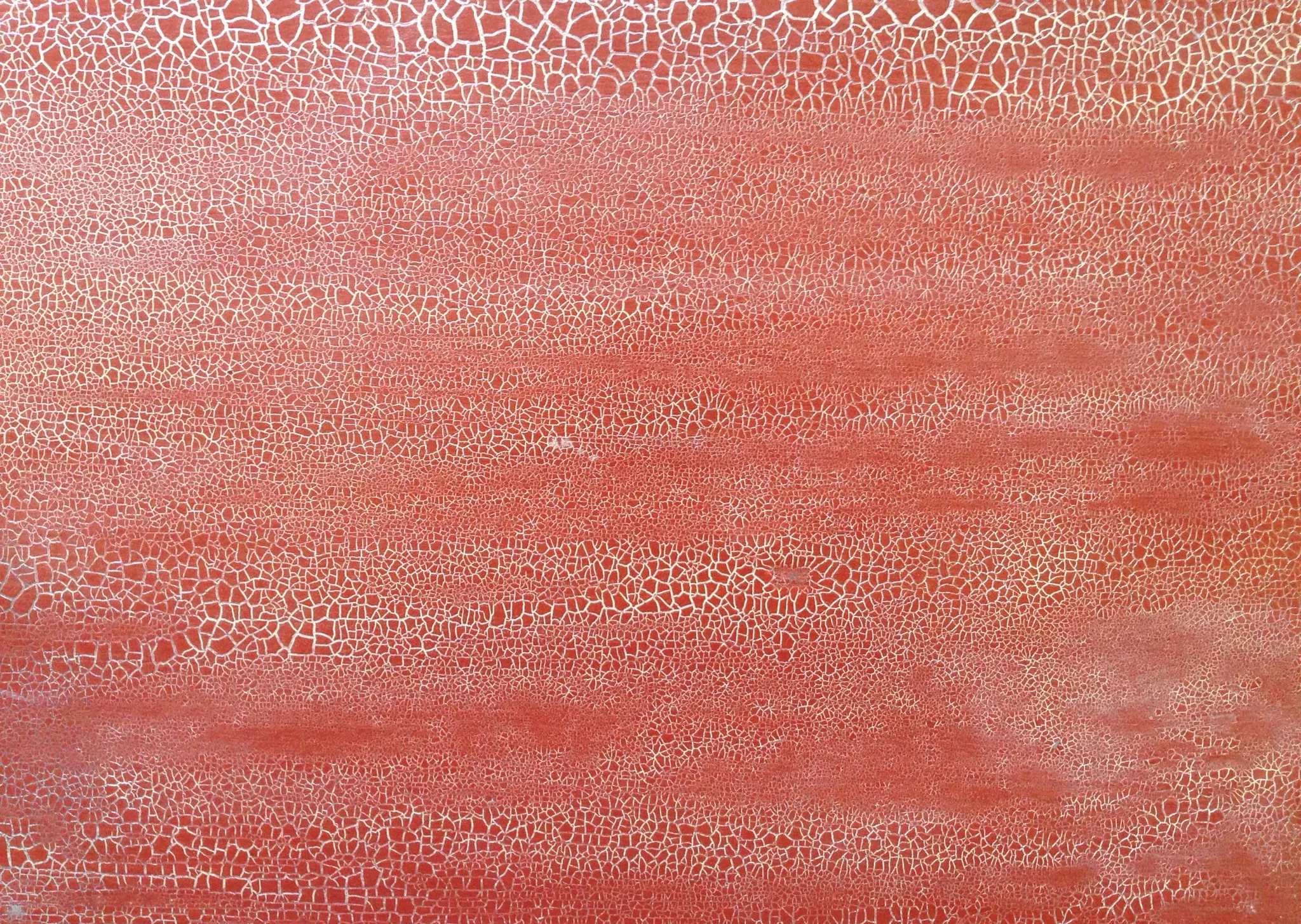 Rote Strukturoberfläche — lebendige Farbwirkung